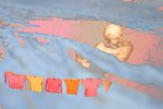 Pink laundry pieta by Allison Alford